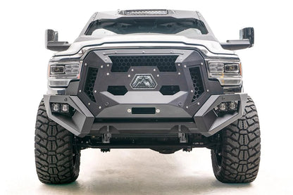 Fab Fours ViCowl on a white Ram 2500, straight-on front view, showing the windshield frame cover, LED light bar, and cowl shape
