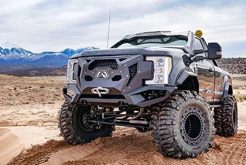 Fab Fours Daylighter front bumper and winch on a lifted Ford Super Duty in the Moab desert