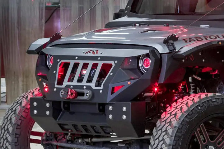 Fab Fours Mall Assault 2015 Jeep Wrangler JK with red LED underglow in warehouse
